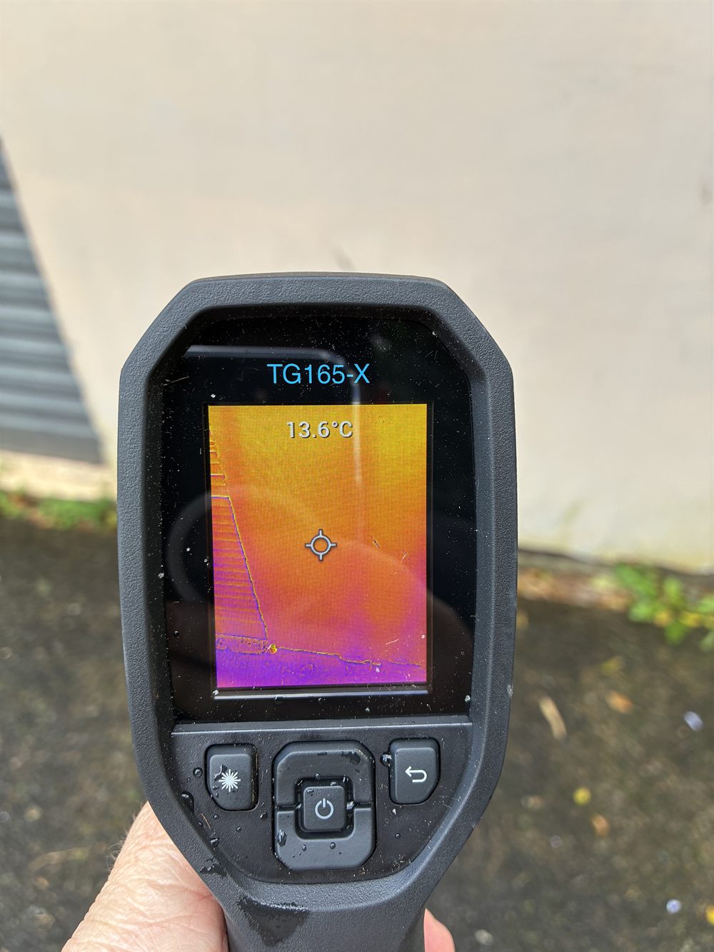 Fumatex using a thermal camera to check for termite activity during an inspection